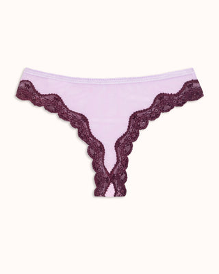 Purple lace-trimmed underwear on a white background