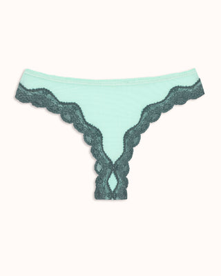 Light blue lace panties on a white background